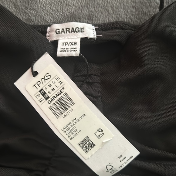 Garage tank top that is mesh and see through, shown in last pic. - Picture 2 of 4